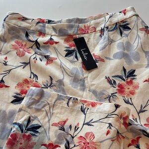 Lulu's Black Logo Label on Cream Fabric